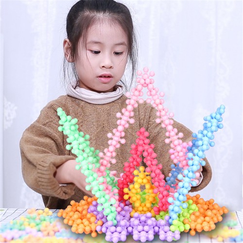 Children's intelligence plum blossom building block splicing toys snowflake tabletop toys wholesale boys and girls