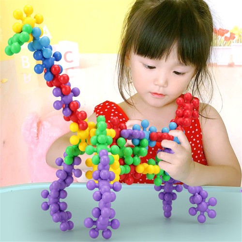 Children's intelligence plum blossom building block splicing toys snowflake tabletop toys wholesale boys and girls